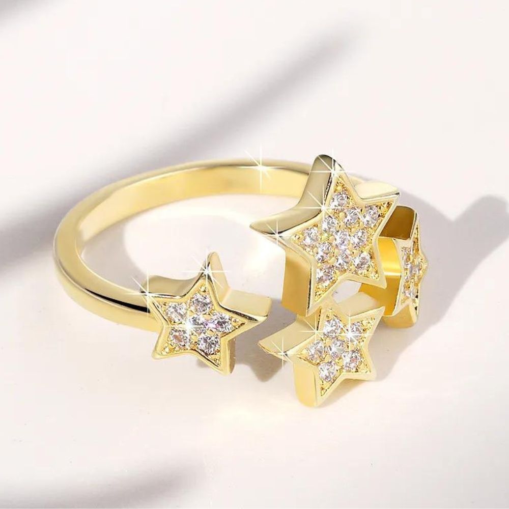 bague avec 4 étoiles et pierres scintillantes pour femme