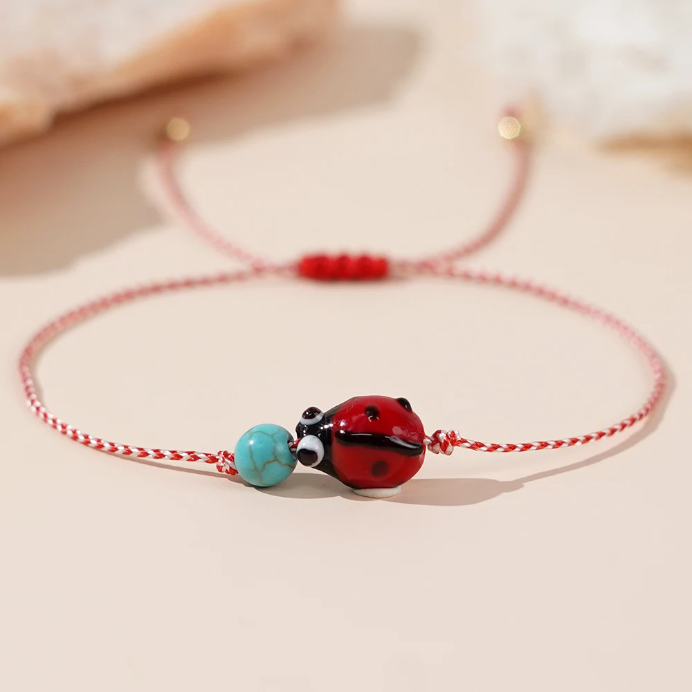 Bracelet Coccinelle Boule Bleue tissu