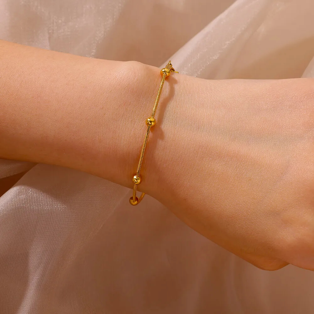 Bracelet Or avec Boules Dorées femme