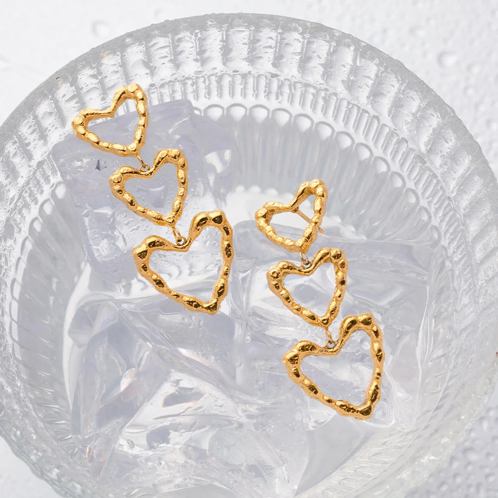 Boucles d'Oreilles Triple Coeurs femme