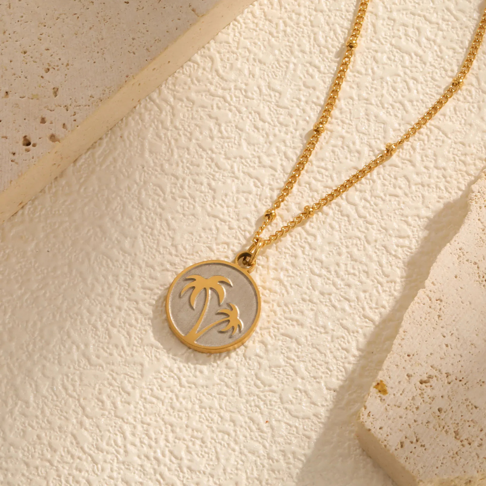 Collier Palmier Nacre Blanc acier