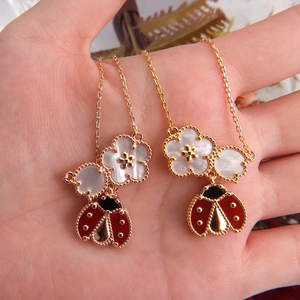 Collier Coccinelle et Fleur breloque