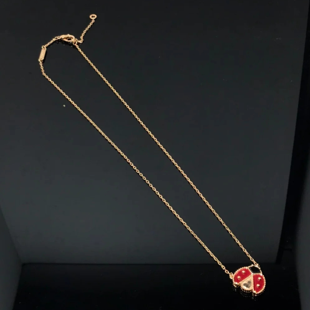 Collier avec Coccinelle or et rouge