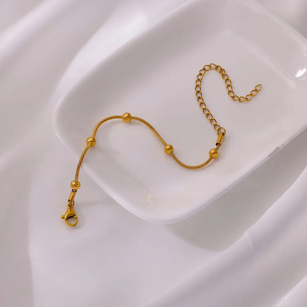 Bracelet Or avec Boules Dorées or femme