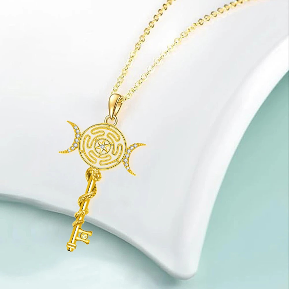 Collier clé mystique doré