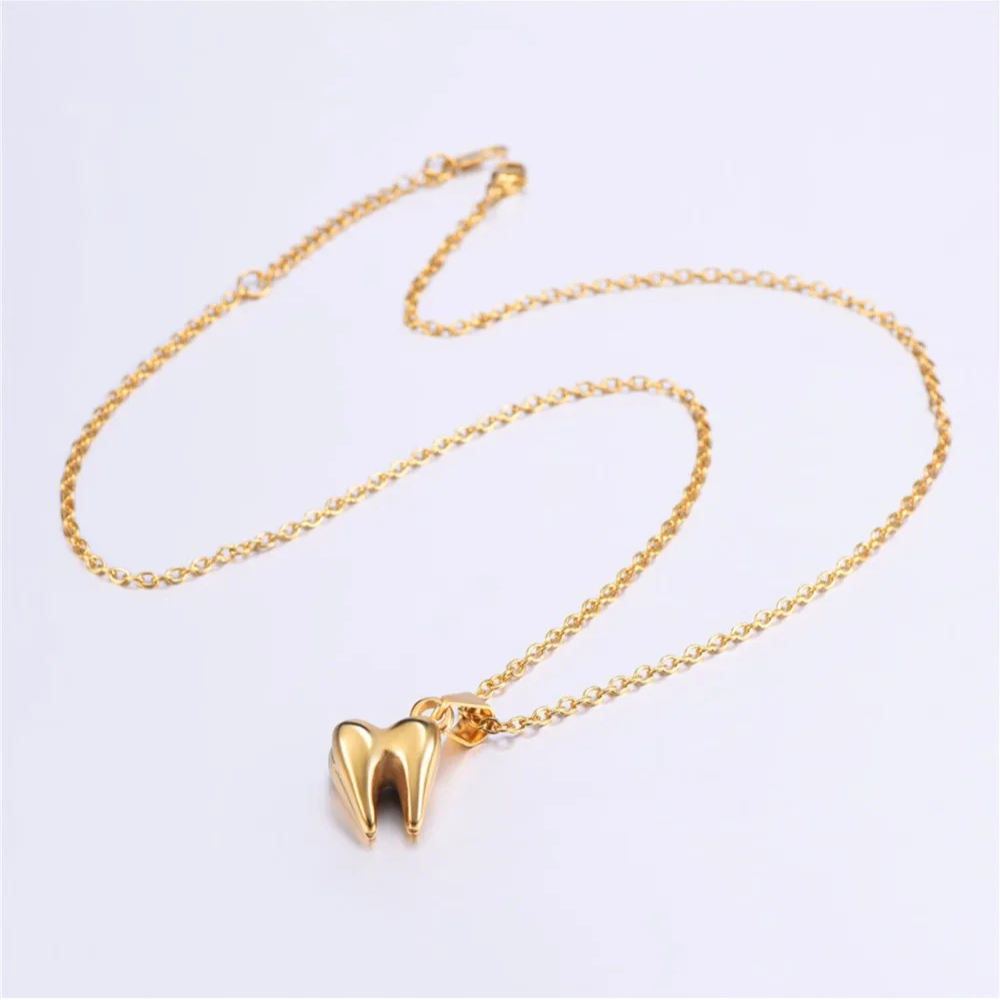 Collier Dent or