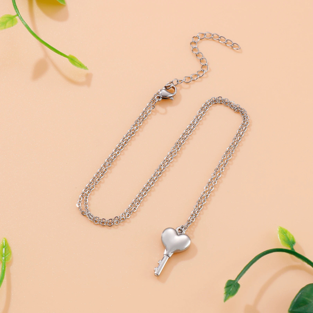 Pendentif Clé Cœur argenté