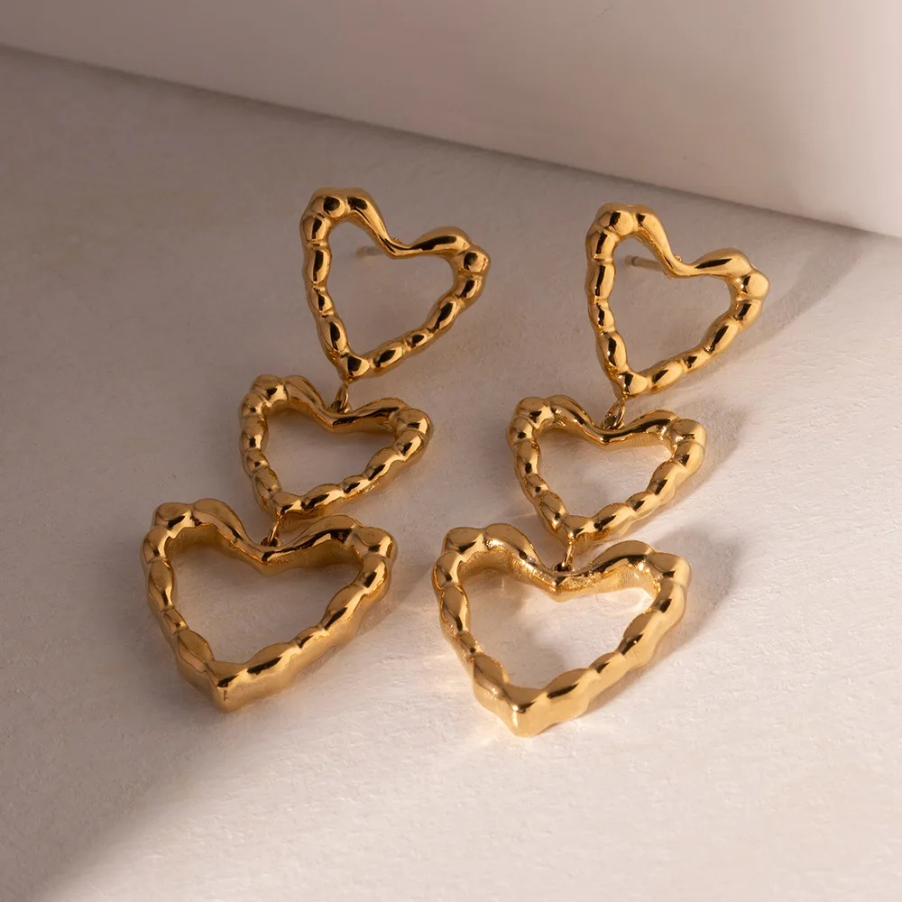 Boucles d'Oreilles Triple Coeurs doré