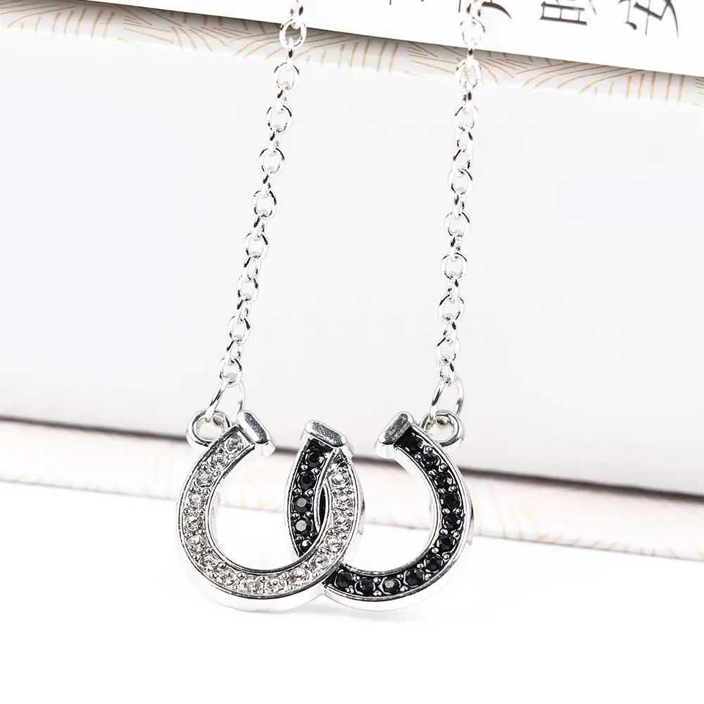 Collier Double Fer à Cheval noir argent