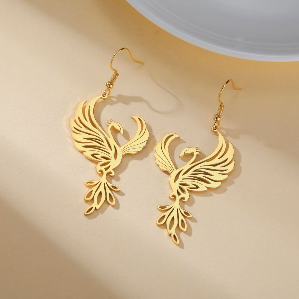 Boucles d'Oreilles Phoenix Femme acier doré