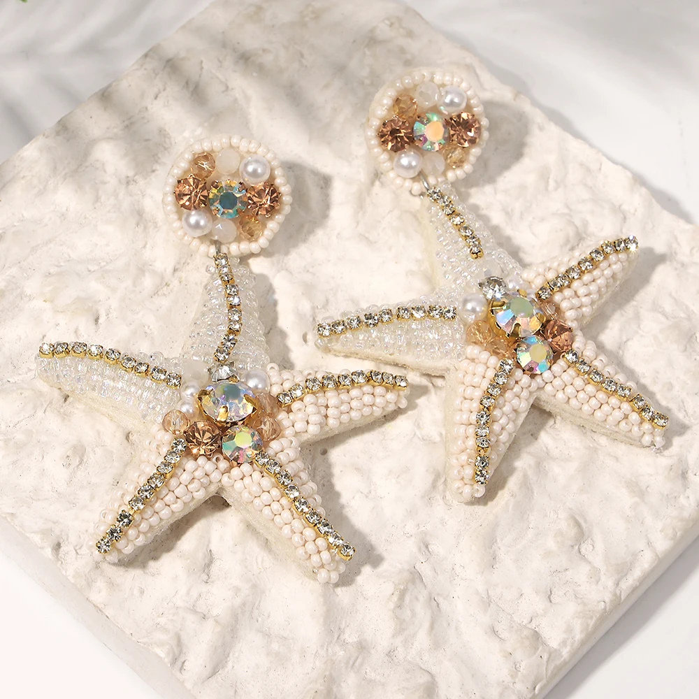 Boucles d'Oreilles Étoile de Mer Perle Couleur pas cher