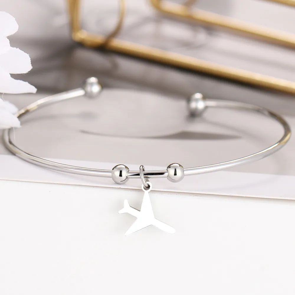 bracelet jonc avion de couleur argent