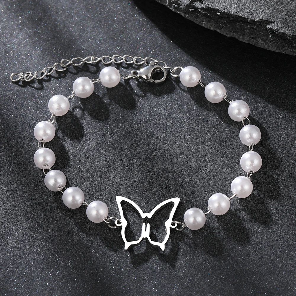 Bracelet Papillon et Perles Blanches