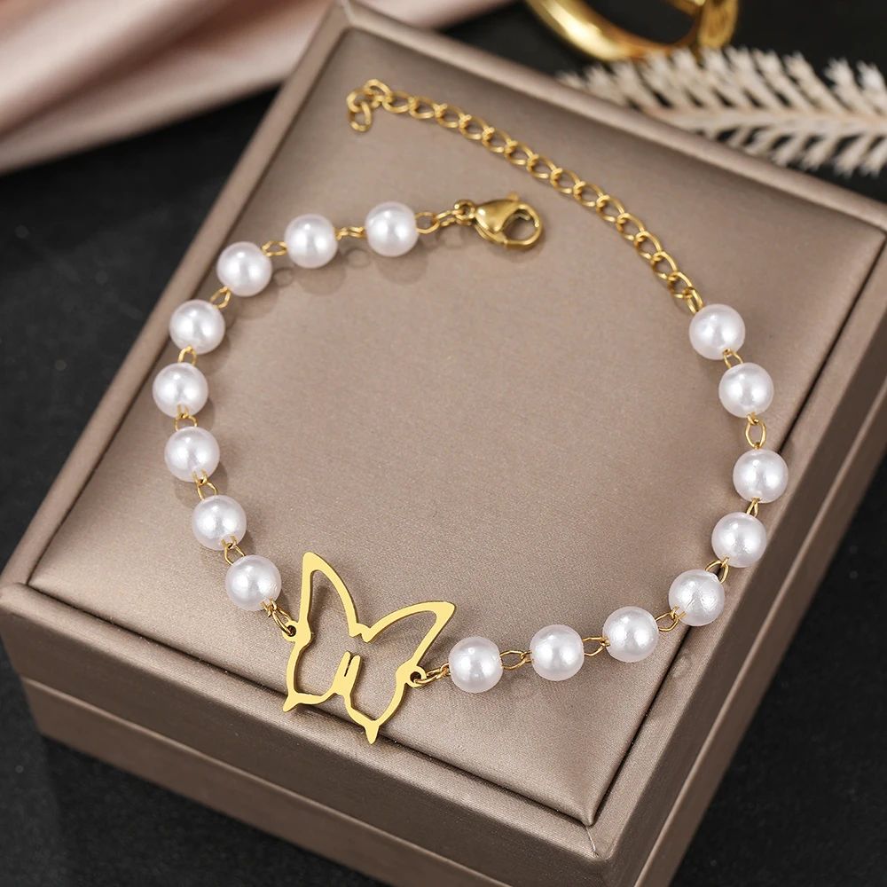 Bracelet Papillon et Perles Blanches Acier